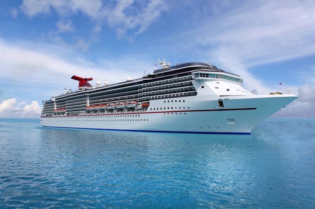 Cruise ship in the clear blue Caribbean ocean.