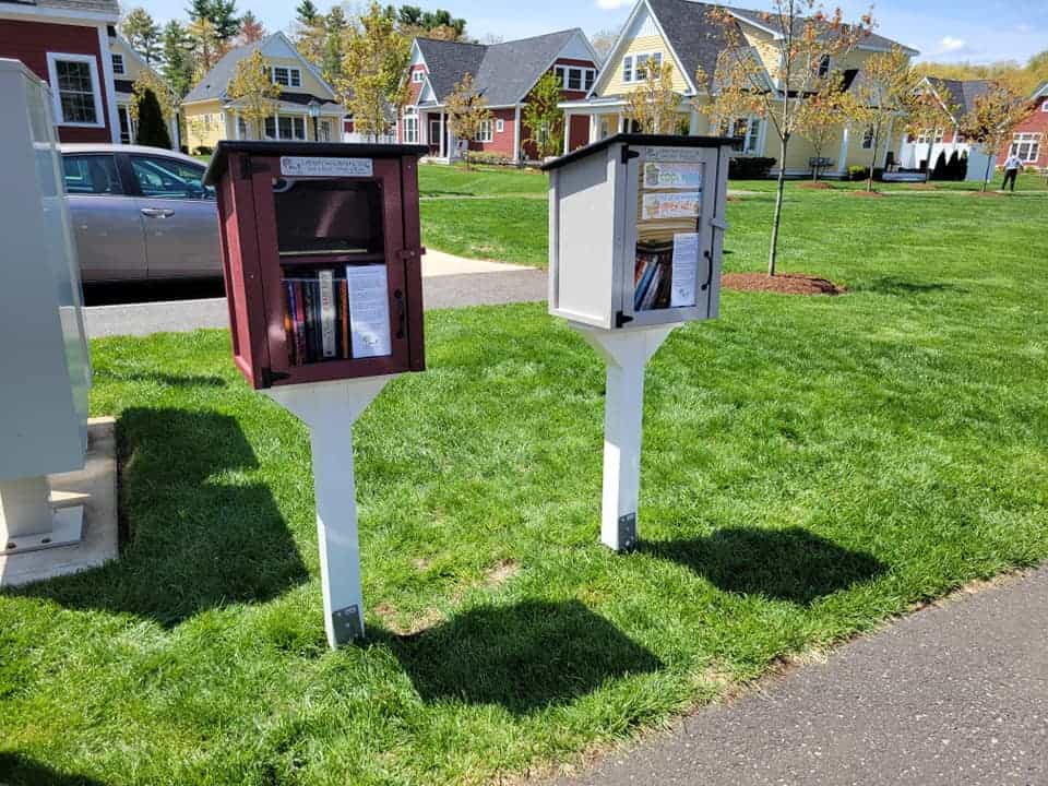 Two little free library locations in a community.