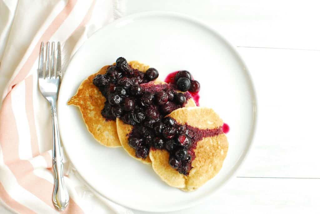 Dollar tree protein pancakes topped with blueberries.